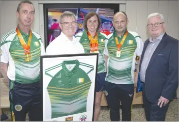  ?? ?? Transplant Team Ireland members from Cork Hugh Nolan, Mairead O’Mahony and Pat O’Sullivan, with Ambassador Gary Gray (centre) and Sean Hosford (right), CEO of HSSCU, sponsors of the team jersey.