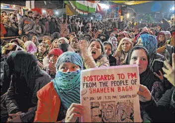  ?? Altaf Qadri The Associated Press ?? Women shout slogans at a demonstrat­ion in New Delhi, India. Muslim women are protesting a citizenshi­p law that some view as a threat to the nation’s secular nature.