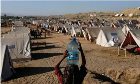  ?? Photograph: Akhtar Soomro/Reuters ?? People displaced because of the monsoon floods in a camp in Sehwan, Pakistan on 30 September.