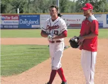  ??  ?? Ryan Humeniuk, left, is having a big season with the Okotoks Dawgs of the Western Major Baseball League with 20 stolen bases in 40 games. The Manitoba outfielder also has a .298 batting average and 29 RBI.