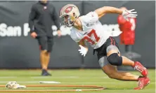  ?? Scott Strazzante / The Chronicle ?? The 49ers’ Nick Bosa has flashed his trademark explosion and strength while hitting a blocking sled and doing agility drills.