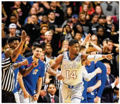  ?? JOHN WEAST/GETTY IMAGES ?? Guard Malik Newman averages 12.3 points per game for Kansas, which earned a share of its 14th consecutiv­e Big 12 title by defeating Texas Tech 74-72 in Lubbock on Saturday.