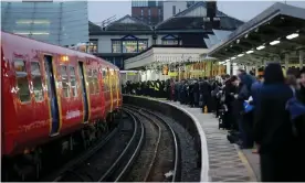  ?? Photograph: Xinhua/Alamy ?? ‘Sometimes it’s a more prosaic moment – catching the bus, standing on a busy platform as a train pulls in, eating a quick lunch on a step or a bench in the middle of the city.’