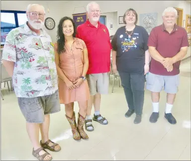  ?? Westside Eagle Observer/SUSAN HOLLAND ?? New officers of the Gravette Lions Club pose just after being installed at the July 2 meeting of the club. Officers for the 2019-2020 Lions year are Jeff Davis (left), treasurer; Cela Gaytan, vice president; Al Blair, president; Karen Benson, tail twister; and Bill Mattler, secretary. Davis, first vice district governor, installed the other officers and he, in turn, was installed by zone chairman Mattler.