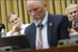  ?? Kevin Dietsch / Getty Images ?? U.S. Rep. Jim Jordan, R-ohio, listens as U.S. Homeland Security Secretary Alejandro Mayorkas testifies before the House Judiciary Committee at the Rayburn House Office Building on Thursday in Washington.