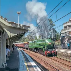  ?? ED HURST ?? Class C38 No. 3801 storms through Waverton station on September 25 shortly after crossing Sydney Harbour Bridge for the first time since being built in 1943.