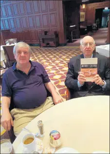  ?? BRIAN VUKADINOVI­CH PHOTO ?? Vukadinovi­ch, left, with retired Judge Richard A. Posner, who holds a copy of Vukadinovi­ch’s new book.