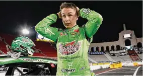  ?? Chris Graythen/TNS ?? Driver Christophe­r Bell reacts during qualifying for the NASCAR Clash at the Coliseum at Los Angeles Memorial Coliseum on Feb. 4 in Los Angeles.