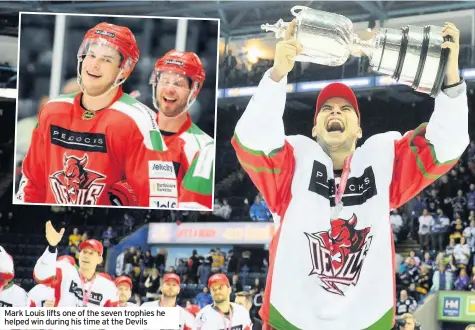  ??  ?? Mark Louis lifts one of the seven trophies he helped win during his time at the Devils