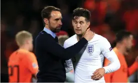  ??  ?? Gareth Southgate consoles John Stones after his error sparked England’s Nations League meltdown against the Netherland­s. Photograph: Mike Egerton/PA