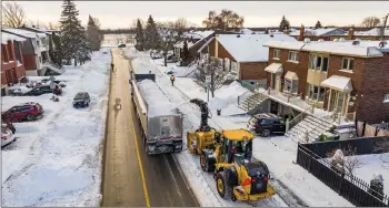  ?? — AFP photos ?? Aerial picture of snow removal operation in Montreal, Quebec, Canada.