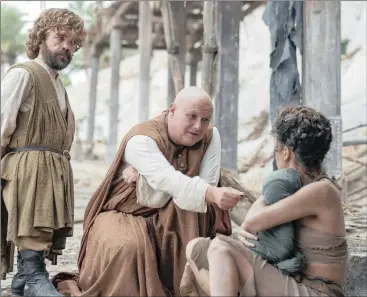  ??  ?? FANNING THE FLAMES: Peter Dinklage as Tyrion Lannister with Conleth Hill as Varys in the sixth season of Game of Thrones. Below, Emilia Clarke as Daenerys Targaryen.