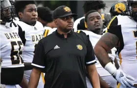  ?? (Pine Bluff Commercial/I.C. Murrell) ?? UAPB Coach Doc Gamble gathers his team before taking the field against Central Arkansas on Saturday in Conway.