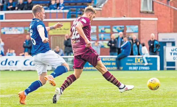  ?? ?? PURPLE PATCH: Callum Hendry scores his side’s fourth goal – and his first in profession­al football – against Queen of the South in August 2018.