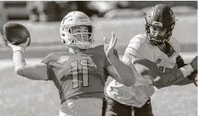  ?? Matthew Hinton / Associated Press ?? Texas quarterbac­k Sam Ehlinger has met with all 32 teams and has tried to develop a quick rapport with receivers before today’s Senior Bowl.