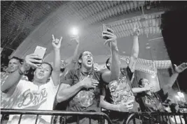  ??  ?? Fans cheer during Xtreme Fighting Nation’s XFN 20 event in Fort Lauderdale on June 9.