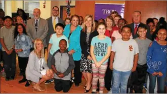  ?? PHOTOS PROVIDED ?? Students in the 21st Century After School Program at Troy Middle School pose with Troy City School District and local officials, including Troy Mayor Patrick Madden, Rensselaer County Executive Kathleen Jimino, Assemblyma­n John McDonald III, D-Cohoes,...