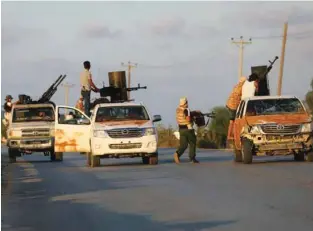  ?? - Reuters/Hani Amara ?? ONGOING CLASHES: Armed forces allied to internatio­nally recognised government fight with armed group in Tripoli, Libya September 22, 2018.