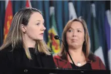  ?? SEAN KILPATRICK THE CANADIAN PRESS ?? Francyne Joe, right, president of the Native Women's Associatio­n of Canada, looks on as Sarah Kennell of Action Canada for Sexual Health and Rights reacts in Ottawa to a UN committee’s recommenda­tions on sterilizat­ion of Indigenous women without consent.