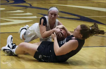  ?? AUSTIN HERTZOG - MEDIANEWS GROUP ?? Methacton’s Allison Hazlett, bottom, and Spring-Ford’s Abbey Boyer dive for a loose ball during the PAC final last season.