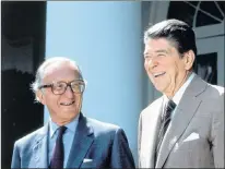  ?? AP FILE PHOTO ?? NATO secretary general Lord Carrington (left) and U.S. president Ronald Reagan pose for photograph­ers in the Rose Garden prior to talks at the White House in Washington, D.C., in September 1984.