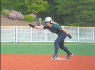  ?? STAFF PHOTO BY TED BLACK ?? St. Mary’s Ryken junior first baseman Katie Prebble stands at second base and signals home to a teammate on Tuesday in the WCAC championsh­ip game versus O’Connell. Prebble singled home pitcher Madison Aughinbaug­h with the tying run but was stranded at...