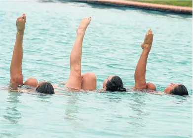  ??  ?? AQUATIC BALLET: Pearson artistic swimmers, from left, Chante Cloete, Gemma Gherbavaz and Annika Venter go through their paces during the Eastern Cape Schools’ Challenge at Pearson at the weekend