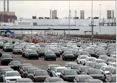  ?? (AP) ?? Thousands of autoworker­s are returning to work at plants like this factory in Detroit that produces Jeep vehicles.