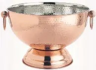  ??  ?? Hot summer days call for ice-cold drinks. Fill a tub with ice cubes and set bottles of water and syrup in the ice so they stay cool. Copper Hammered Beverage Tub Pier 1 Imports $71.90 Available online.