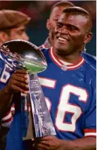  ?? 1996 FILE/GEORGE MILLER/AP ?? To Lawrence Taylor (above), Bill Belichick is No. 2 among coaches, to Bill Parcells.