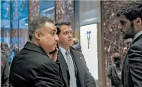  ?? KATHY WILLENS/AP 2016 ?? Imaad Zuberi, far left, arrives at Trump Tower in New York. Zuberi agreed this month to plead guilty to making illegal campaign contributi­ons on behalf of foreign nationals.