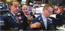  ?? Richard Drew / Associated Press ?? Wednesday’s sharp selloff was caused by an unusual developmen­t in the bond market that often foreshadow­s a recession.