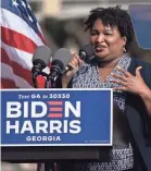  ?? ELIJAH NOUVELAGE/AFP VIA GETTY IMAGES ?? Former representa­tive Stacey Abrams speaks at a rally Monday.