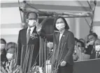  ?? YING-YING/AP CHIANG ?? Taiwan’s President Tsai Ing-wen, right, and Yu Shyi-kun, speaker of the Legislativ­e Yuan, cheer with the audience during National Day celebratio­ns Sunday in Taipei.