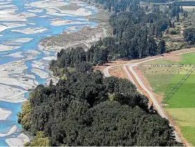  ?? IAIN McGREGOR/ STUFF ?? A dairy farm on the banks of the Waimakarir­i River. The elevated level of nitrates was proposed due to polluted water flowing into aquifers from North Canterbury dairy farms.