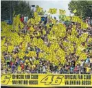 ??  ?? The sea of yellow will be sorely missed once the great man finally calls it a day out on track