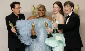  ?? Allison Dinner/EPA ?? No whiteout this year … Robert Downey Jr (best supporting actor), Da'Vine Joy Randolph (best supporting actress), Emma Stone (best actress) and Cillian Murphy (best actor). Photograph: