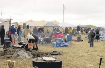  ?? JAMESMACPH­ERSON/ASSOCIATED PRESS ARCHIVES ?? Hundreds of protesters have gathered in North Dakota to try to stop constructi­on of an oil pipeline.