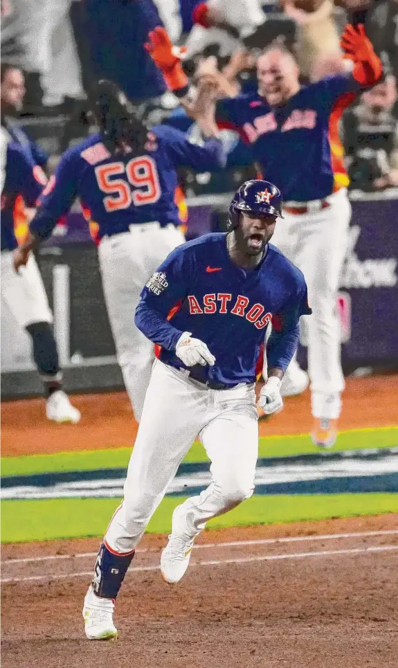  ?? Jon Shapley/Staff photograph­er ?? Yordan Alvarez gave the Astros all the cushion they needed in the World Series clincher, hitting a three-run homer in the sixth to put them up 3-1 over the Phillies.