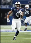  ?? RON JENKINS — THE ASSOCIATED PRESS ?? Penn State’s Journey Brown (4) runs for a touchdown during Saturday’s Cotton Bowl win over against Memphis in Arlington, Texas.