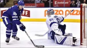  ?? FRANK GUNN, THE CANADIAN PRESS ?? Maple Leafs forward Mitch Marner is stopped by Tampa Bay Lightning goaltender Andrei Vasilevski­y in the second period. Vasilevski­y stopped 30 shots for his league-best sixth shutout of the season.
