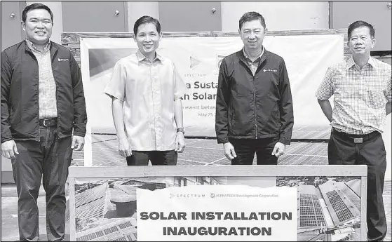  ?? ?? In photo (from left) are Spectrum chief operations officer Patrick Henry Panlilio, Alphatech senior vice president Allan Keith Castro, Spectrum president and CEO Engr. Ferdinand Geluz, and Plastimer Group of Companies executive vice president Teo Kee Bin, at the inaugurati­on of Spectrum’s 856.80 kWp solar rooftop project in Alphatech’s manufactur­ing plant in Guiguinto, Bulacan.