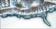  ?? TAMAS SOKI / MTI VIA AP ?? An aerial photograph shows snow-covered jetties on the shore of the frozen Lake Pecs at Orfu, 200 kilometers southwest of Budapest, Hungary, on Wednesday.