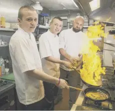  ??  ?? 2 Young chefs are getting a leg-up into kitchen work through an award-winning scheme