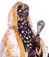  ??  ?? Emir of Kano Aminu Ado Bayero holding the staff of office