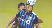  ?? JOHN MAHONEY FILES ?? The Impact let go homegrown striker Anthony Jackson-hamel, seen here heading the ball in a game in August.