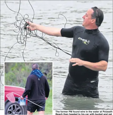  ??  ?? The former PM found wire in the water at Polzeath Beach then headed to his car with bucket and net