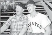  ?? David F. Smith Associated Press ?? ‘WIZARD OF WHIFF’
Paul Pettit, right, and Bing Crosby at the Pittsburgh Pirates’ training camp in San Bernardino in 1950.