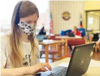  ?? Photo courtesy of Matt Fry ?? Liberty-Eylau High School senior Jordan Morrow completes the online portion of CPR training in the sSchool library. L-EISD is among local Texas schools continuing with COVID-19 protocols despite Gov. Greg Abbott lifting the mask mandate.