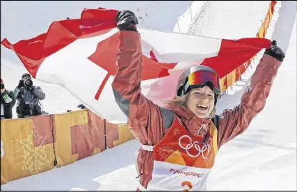  ?? AP PHOTO ?? Cassie Sharpe celebrates after winning the gold medal in the women’s halfpipe final.